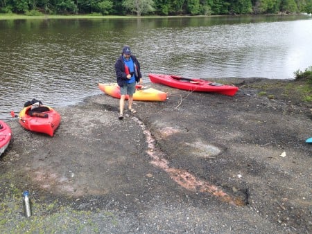 Arthur Cemelli documents seepage at the Popp Memorial Park boat launch on the Wallkill River. (Photo by Dan Shapley / RIverkeeper)