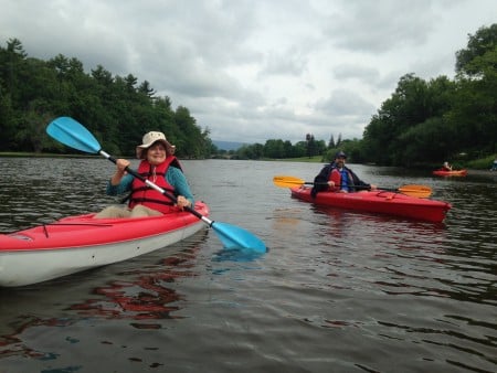 Patricia Henigan and Brenda Bowers paddle the Wallkill River. (Photo by Dan Shapley)