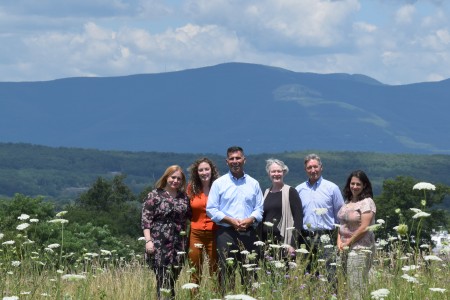 County Executive Mike Hein with environmental leaders at the former RRA landfill site in the Town of Ulster where the proposed 3.341 kWh solar project would be located. (Photo: EPA)