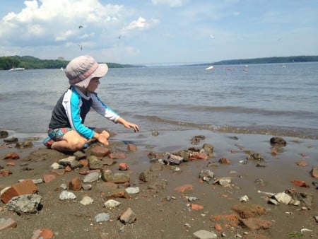 My three-year-old son, Ben, at Kingston Point beach after the Great Hudson River Fish Count. The shoreline is littered with bricks from the defunct Hutton brick yard. (Photo by Dan Shapley / Riverkeeper)