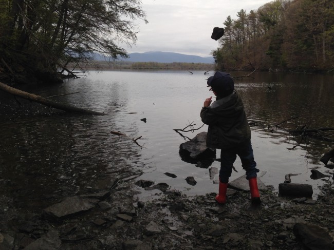 Boy throws rock. (Photo by Dan Shapley / Riverkeeper)