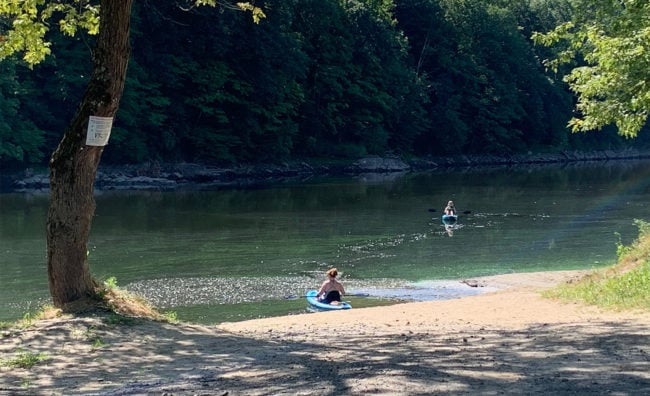 Kayakers enter the Rondout Creek affected by armful Algal Bloom